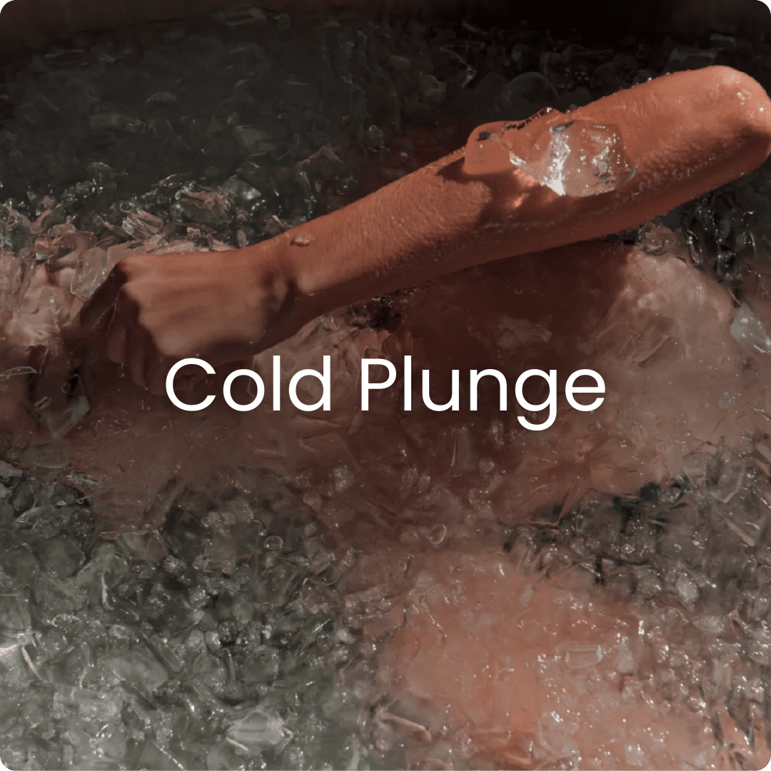 Person submerging in ice bath.