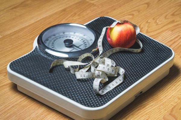 scale with measuring tape