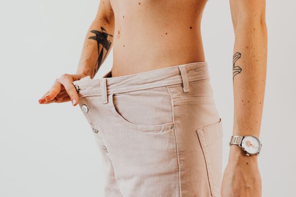 woman with pants that are too big