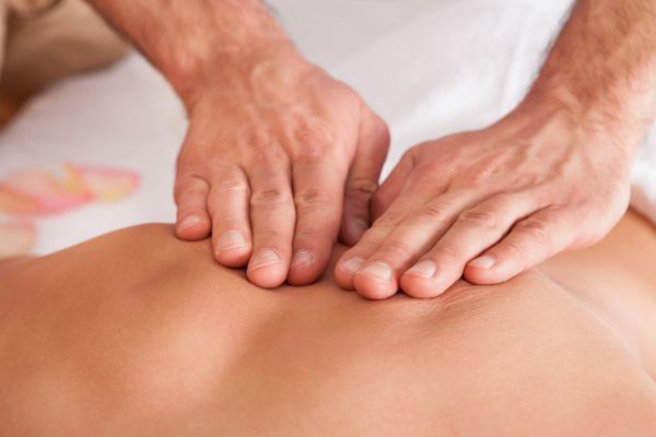 person getting a back massage